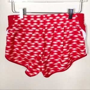 peach color nike shorts